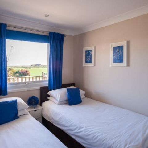 The second bedroom with guest bed up