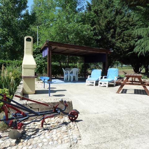 Terrace, BBQ, sun loungers under shaded terrace
