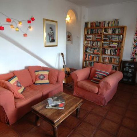 Lounge with library, TV, DVD and music