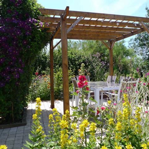 The Private Patio and Pergola at L'Ecurie Holiday Home