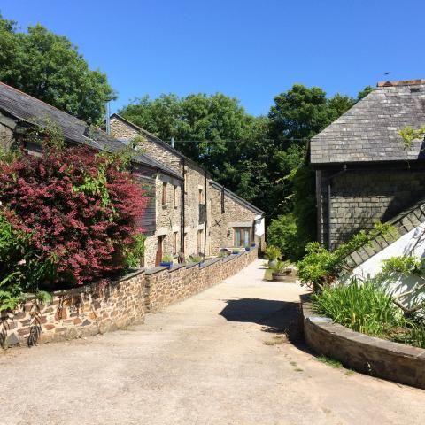 Entrance to the courtyard with the Corn Barn on the left.