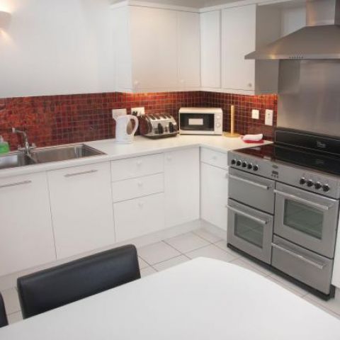The well equipped kitchen in the Threshing Barn