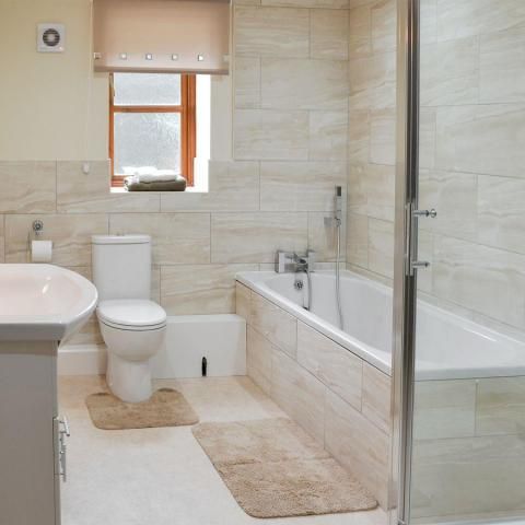 family bathroom with separate bath & shower