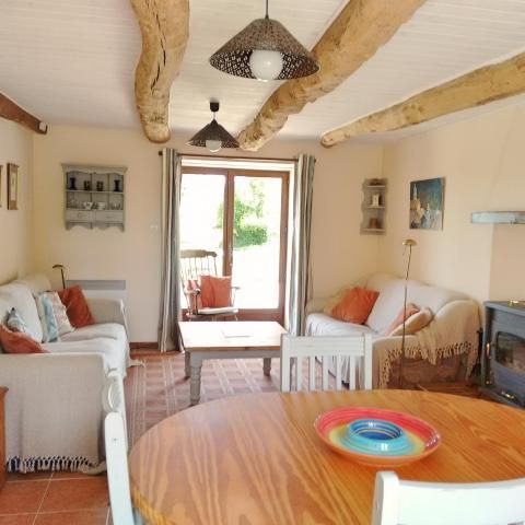 La Petite Longere, living room with french doors to the terrace