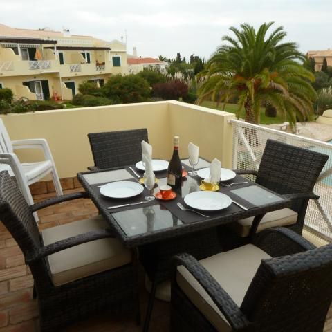 Upper terrace overlooking the pool and gardens