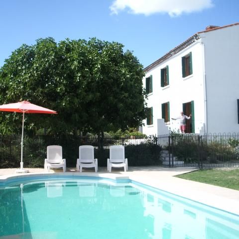 The pool with the villa behind