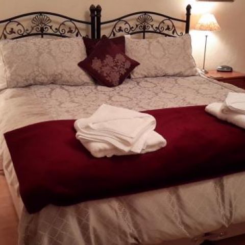 Woosh! Single beds become superking in family room