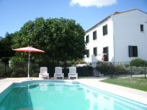 The pool with the villa behind
